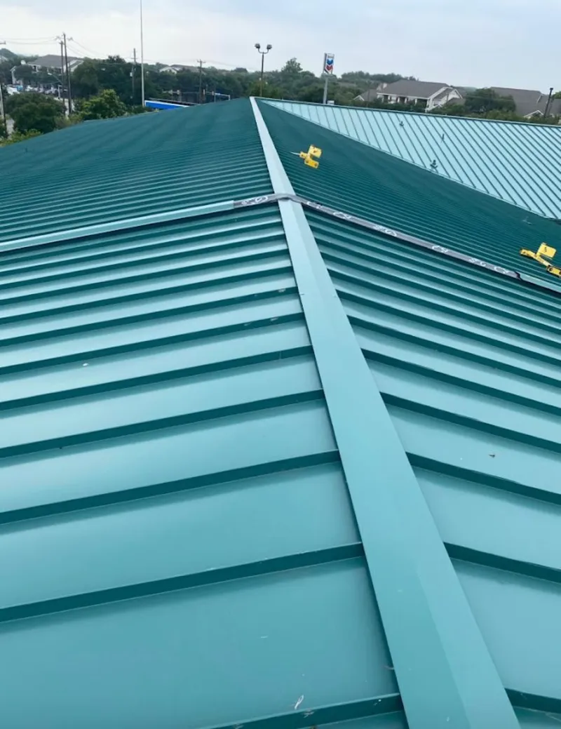 Green commercial metal roof ridge and valley for Metal Roof Repair in Forest